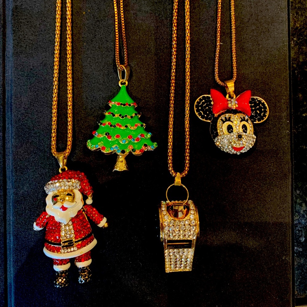 Four Betsey Johnson necklaces